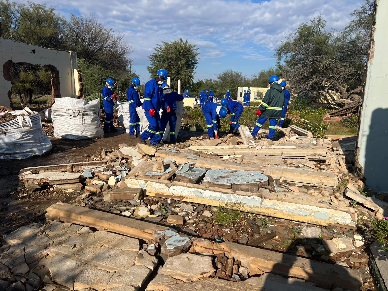 Asbestos removal team at demolition site