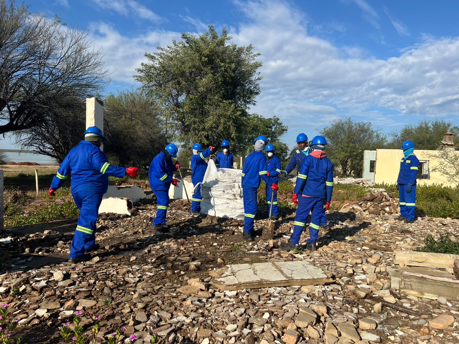 Team bagging asbestos debris
